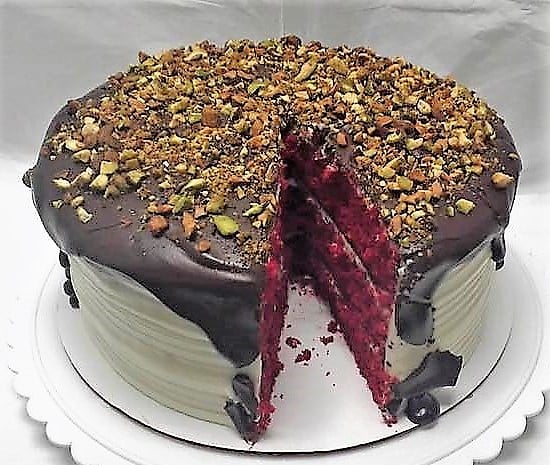Red Velvet Cake with Chocolate Ganache & Pistachios | Raleigh NC (pic: facebook.com/premiercakesbakerycafe)